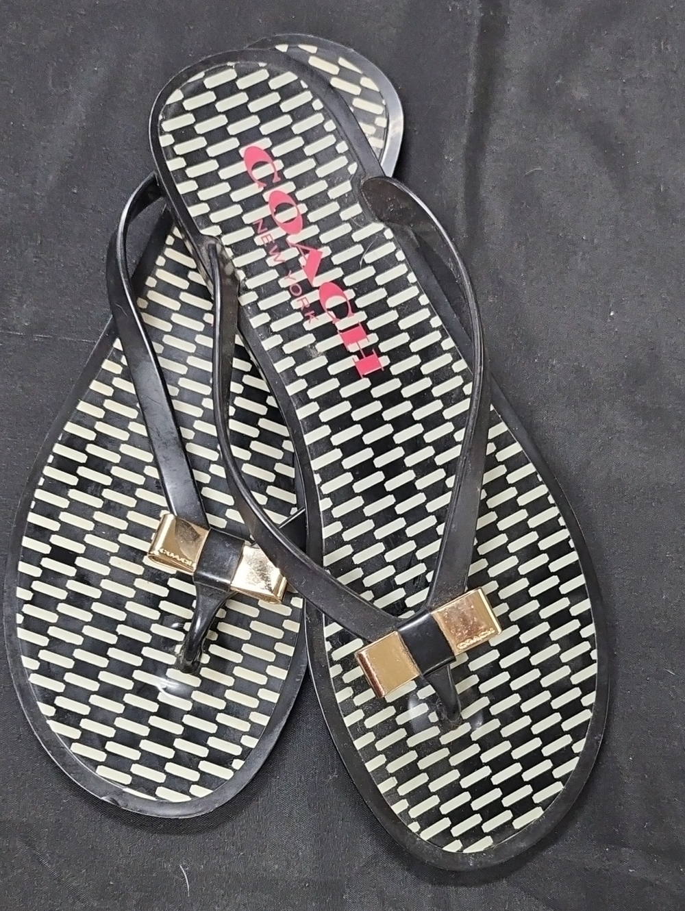Coach Black Flip Flop Sandals with Gold Bow Accent